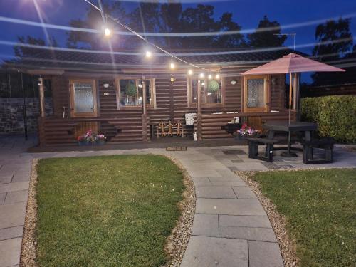 入口, Cosy Countryside Log Cabin in 其他地區