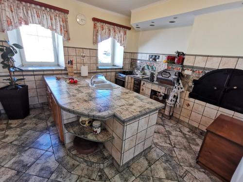 Charming village house with patio and garden in Словенське Коньїце