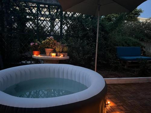 Superbe appartement avec jacuzzi avec jardin privé