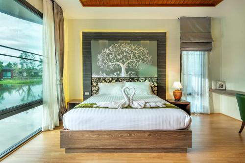 Boat House Boutique Riverside in Nakhon Chai Si