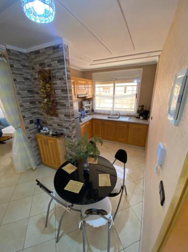 Perle bleu in 사이디아