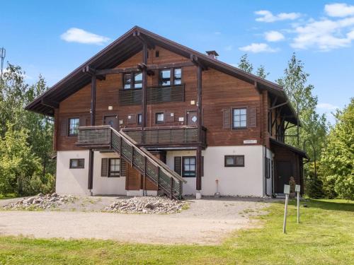 Holiday Home Alppitalo vihertähti 5 apt 2 by Interhome