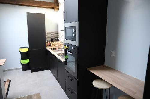 virtuve, Appartement neuf climatisé (Appartement neuf climatise) in Aramits