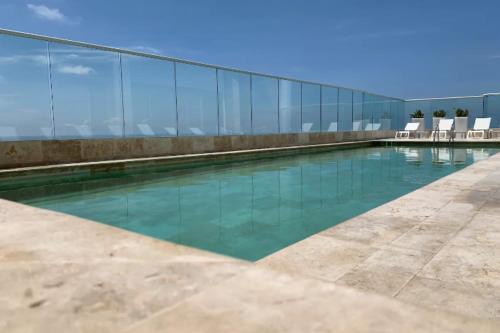Swimming pool, Apartamento Moderno con Vista al Mar en Bocagrande Cartagena in El Laguito