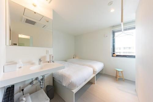 plat hostel keikyu sapporo ichiba Room Type - Standard Twin Room with Shared Bathroom