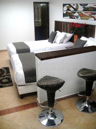 Hotel Boutique Embajada de la Feria The 3-star Hotel Boutique Embajada de la Feria offers comfort and convenience whether youre on business or holiday in Bogota. The property features a wide range of facilities to make your stay a plea