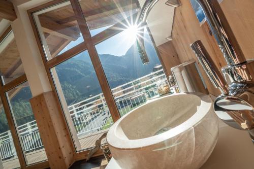 سبا, Genusshotel Alpenblick in لانجينفيلد