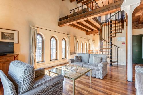 GuestHost - Molino Stucky Residence Suites 1