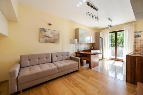 Green District 2BR AirConditioned P by BookingHost, Warsaw