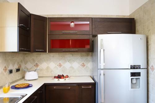 Kitchen, Appartamento con terrazzo a Capodimonte by Wonderful Italy in Capodimonte