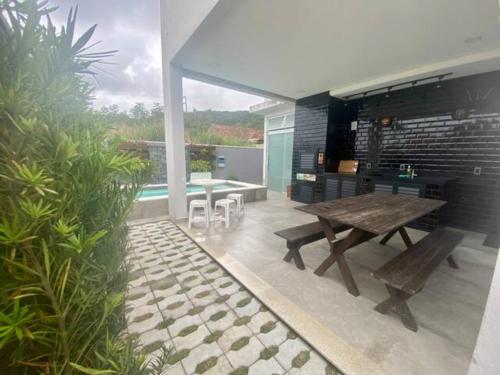 Swimming pool, Casa de Ferias com Piscina em Bombinhas in Sertaozinho
