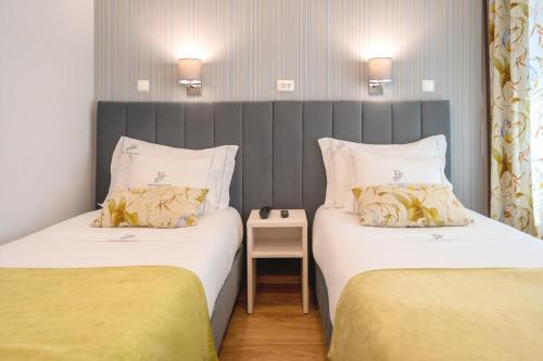 Dinya Lisbon Hotel - Tap to explore photos