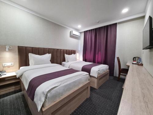 Sharaf Hotel – Toshkent, NY