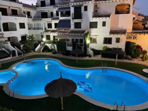 Modern pool view apartment in Cabo Roig