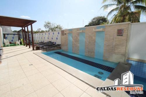 Apartamento confortável em caldas novas com espaço aquático, 6 piscinas , 3 hidromassagem , Bar e Restaurante , Sauna , espaço kids