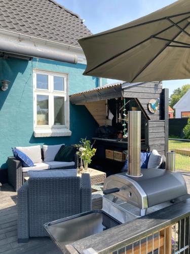 Comoditats, Det blågrønne Hus (Det blagrønne Hus) in Hals