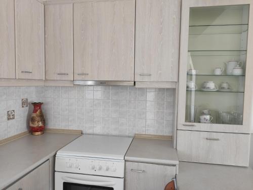 廚房, White Clam Vintage House with sea view & garden in 麥克里吉亞洛斯