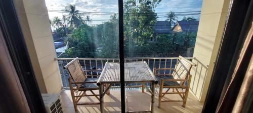 شرفة/ تراس, بيت الشباب بي آند تي (P & T Hostel) in بو بوت