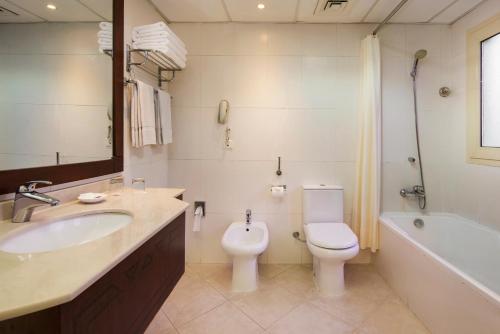 Bathroom, Al Hamra Village Hotel in Beachfront