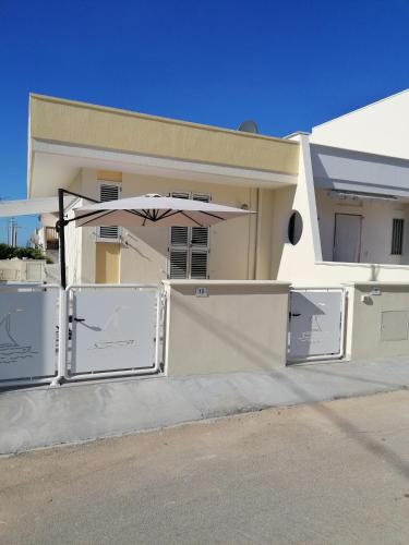  Villetta Lido Marini, Unterkunft in Lido Marini