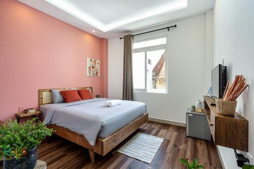 HoLo Central Saigon - Serviced HomeStay - Tap to explore photos