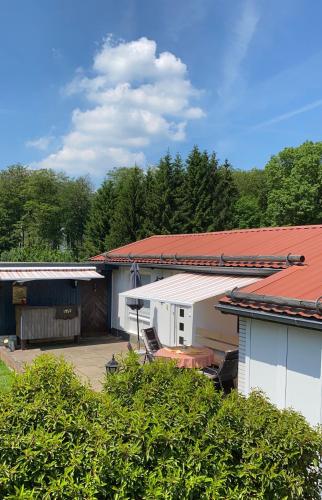 Casita - Sterneferienhaus mit Garten, Sauna und Wallbox