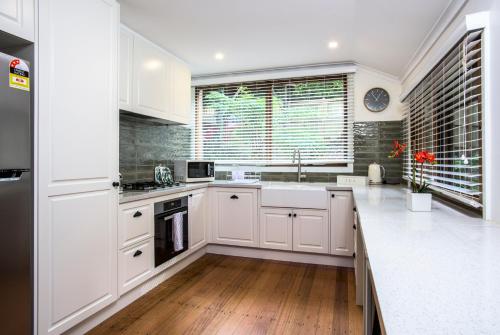 Cosy, central Olinda Camellia Cottage, Olinda (Foto 6)