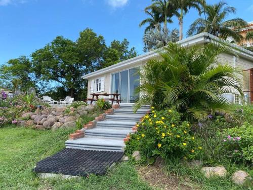 Villa spacieuse raffinée dans son écrin de verdure - Location, gîte - Les Anses d'Arlet