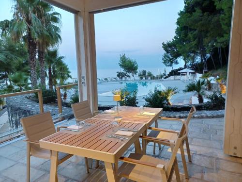 餐廳, Apulia Hotel Baia Dei Faraglioni in 馬蒂納塔