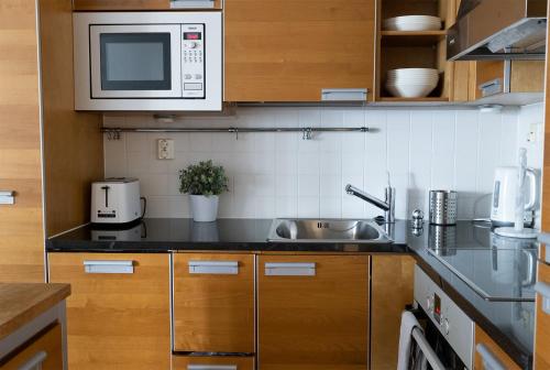 2ndhomes Luxury 1BR Kamppi Center Apartment with Sauna and Big Terrace