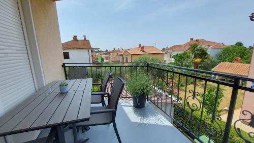 Two-Bedroom Apartment with Balcony