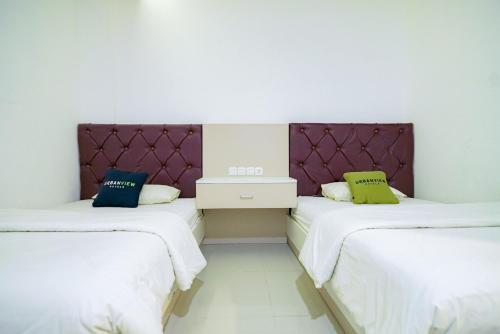 Urbanview Hotel Syariah Ratu Kuring Gisting by RedDoorz