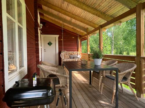 Bogärdan, cozy cabin by the Luleå River (Bogardan, cozy cabin by the Lulea River) in Harads