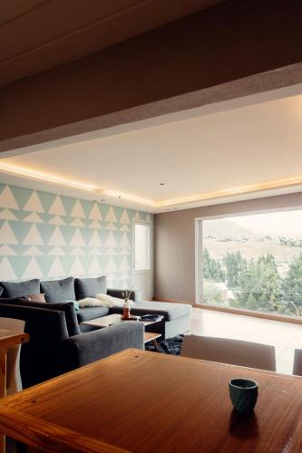 ห้องส่วนกลางสำหรับนั่งเล่น/ดูทีวี, Montano Boutique Suites in เอล คาลาฟาเต้