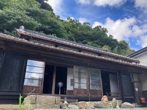 Entrance, ゲストハウス大安吉田 in Matsuzaki