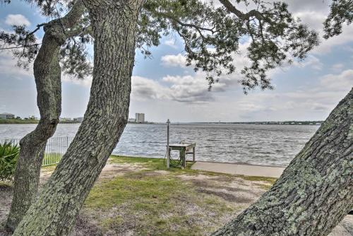 Waterfront Gulf Shores Condo with Patio Pier and Pool - main image