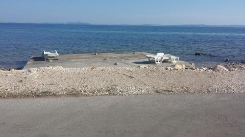  Apartments by the sea Vir - Kozjak, Vir - 16386 in Vir