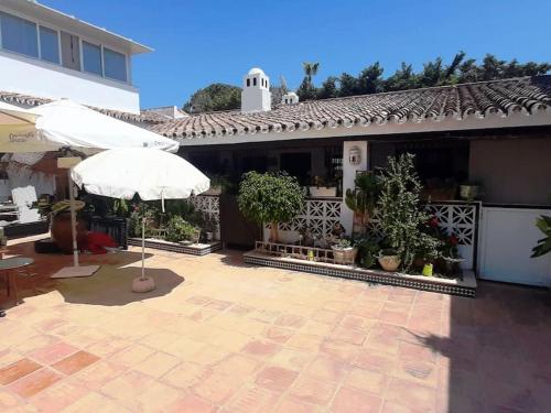 PLAYA a1 MIN, AUTO CHECK-IN, PATIO, ADOSADO gîte à louer Las Chapas