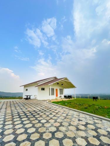 ทัศนียภาพภายนอกโรงแรม, Tinton Hillstay in การาทิฮัลลีกาวาล