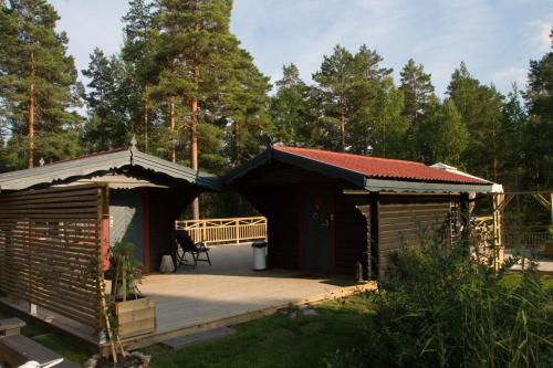 Timber cottages with jacuzzi and sauna near the lake Vänern - Karlstad