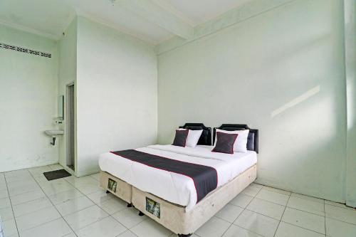 Capital O 91466 Hotel Neu Backpacker Tf Syariah (smk Tb)