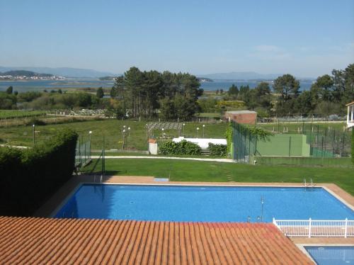 Adosado Ensenada Toxa con piscina a 4 kilometros de la playa gîte à louer Outeiro