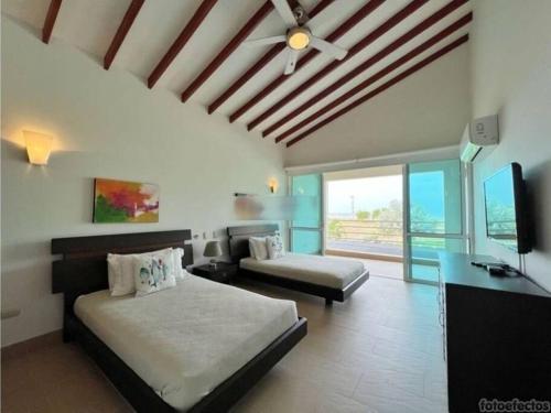 Casa Arcoíris: Espectacular casa en Cartagena con Acceso directo a la Playa (Casa Arcoiris: Espectacular casa en Cartagena con Acceso directo a la Playa) in อาโรโย เด เปียดรา