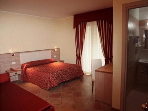 Hotel Eden Sul Lago Room Type - Quadruple Room with Balcony