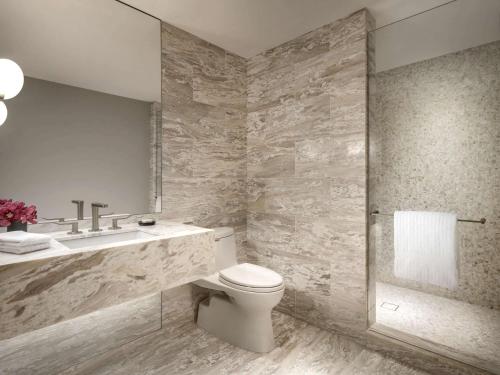 Signature One Bedroom Corner King Suite with Three Balconies and Sofabed