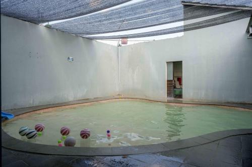 Swimming pool, RedDoorz Syariah near Pasar Godong Grobogan in Purwodadi