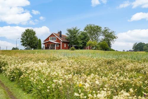 Lovely holiday home in the village of Flattinge, with a view of lake Flaren