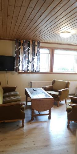 בר/טרקלין, Apartment in Selatrað - Free parking in Hósvík