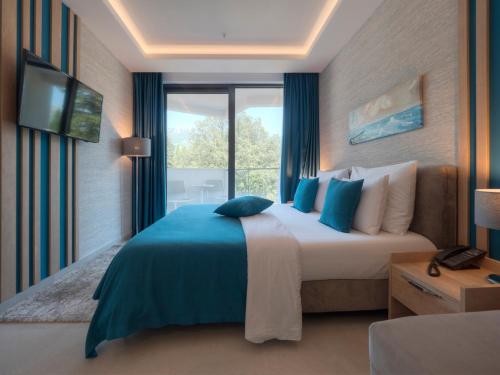Chambre double avec 1 ou 2 lits, supérieure, vue partielle sur la mer