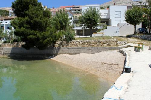 Apartments by the sea Dinjiska, Pag - 9386